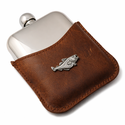 Silver flask with brown leather pouch featuring a fish emblem on a white background